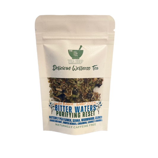 Package of 'Bitter Waters Purifying Reset' wellness tea from The Tea Shop on a white background