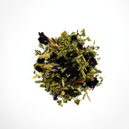 A pile of dried blueberry-licious tea leaves with floral notes, a mix of green and blue hues