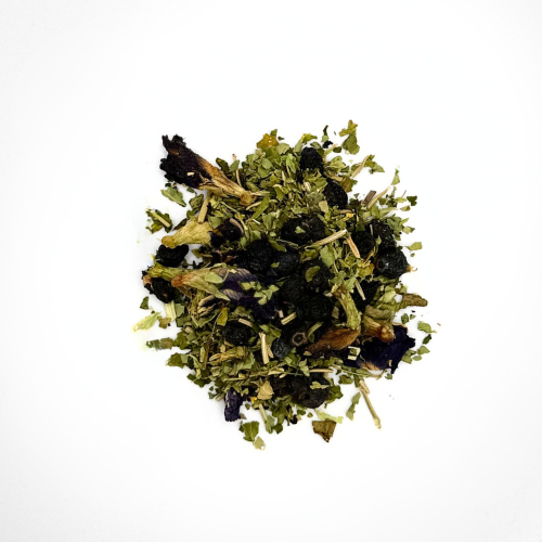 A pile of dried blueberry-licious tea leaves with floral notes, a mix of green and blue hues