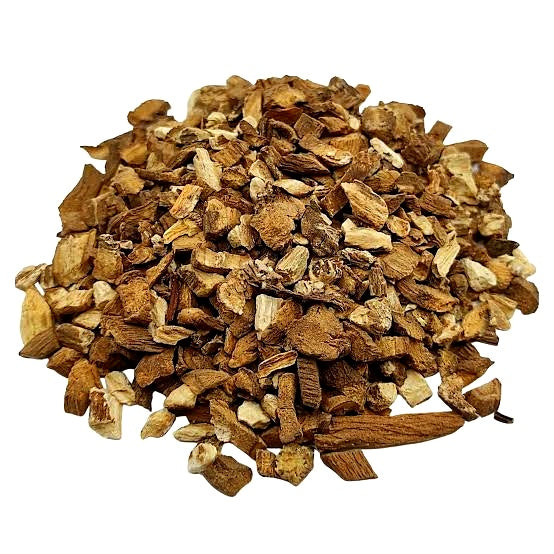 Heap of dried herbs on a white background