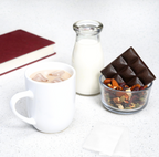 Image of iced Chocolate venus tea with milk, and chocolate on white background
