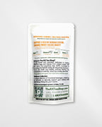 A single white stand-up pouch of The RX Tea Shop's 'Awakening Collection' tea, shown against a light gray background. The back of the pouch features detailed product information, ingredients, and a QR code.