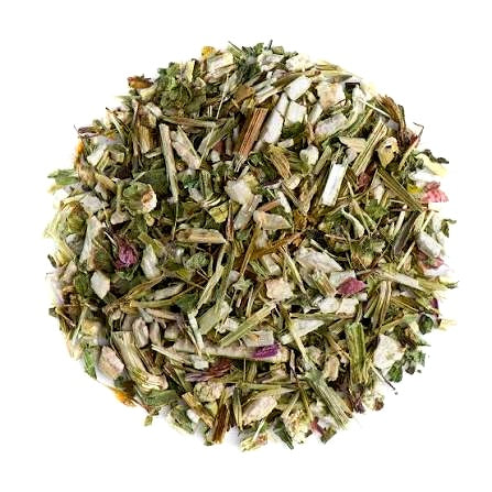 A circular pile of loose-leaf herbal tea blend containing dried green leaves, and small pink accents, isolated on a white background.