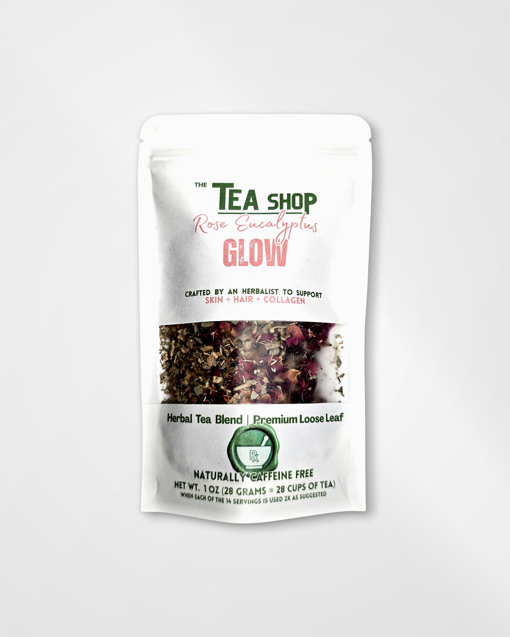 A stand-up pouch of 'The Tea Shop' Rose Glow Herbal Tea Blend, featuring a white background with green and pink text and a clear window showing the loose leaf tea inside.