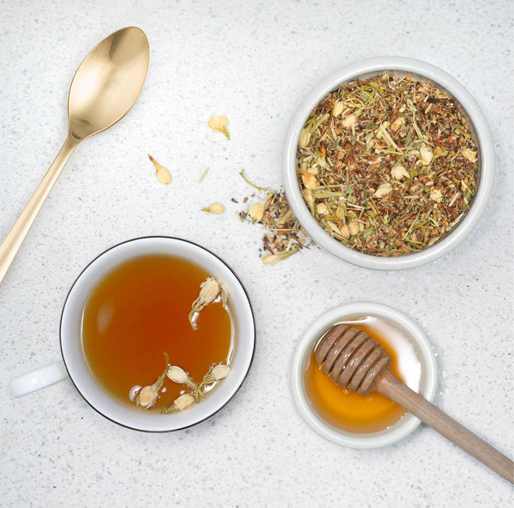 jasmine flowers and honey on a white background 
