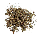 A pile of dried, chopped herbal tea ingredients, showing various shades of brown, tan, and olive green, isolated on a solid white background.
