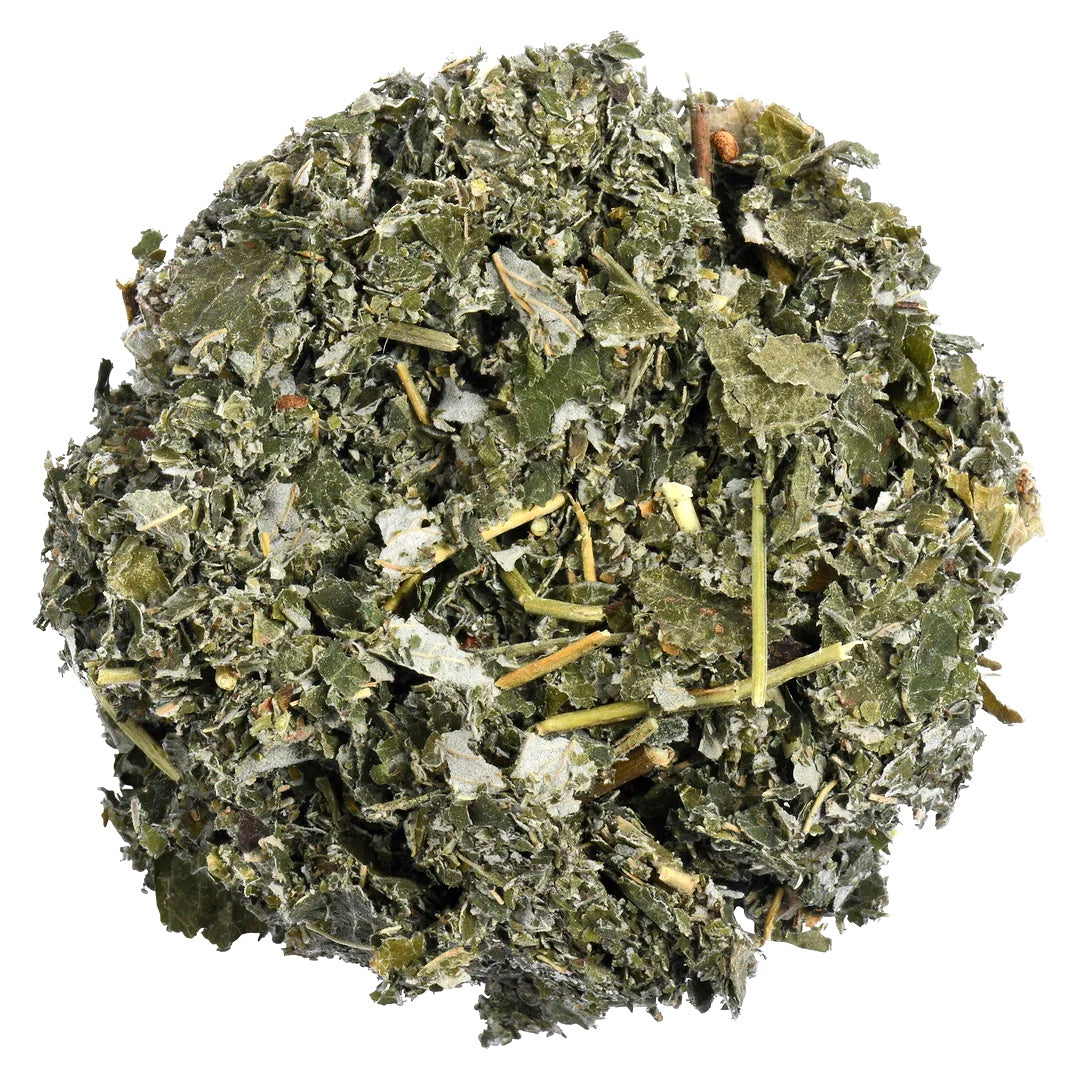 A circular pile of dried, chopped green leaves and stems, likely a herbal tea or dietary supplement blend, isolated on a solid white background.