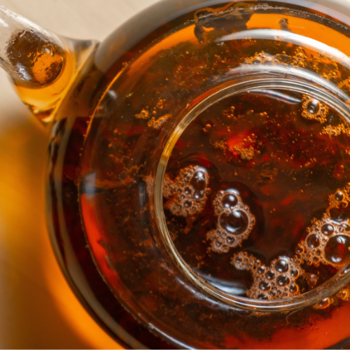 Image of Royal Dragon Tea brewed in a clear teapot
