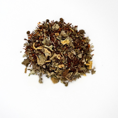 Heap of dried herbs on a white background