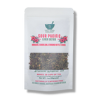 Tea package labeled 'Sour Pacific Liver Detox' with window showing herbs on a white background