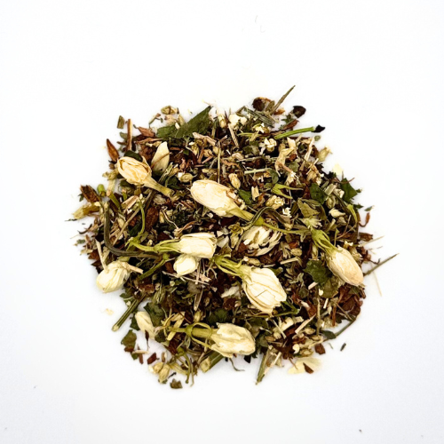 Dry herbs and jasmine flowers on a white background