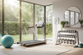 a sunlit  home gym with a treadmill, yoga ball and weights